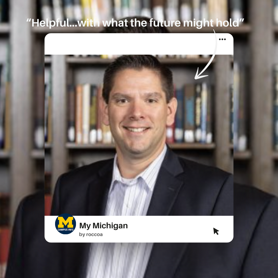 Polaroid photo-design of Rocco's mentor, Econ advisor Mitchell Dudley, a white middle-aged male with short brown hair, in an open button-down shirt and dark sport coat, posed in front of book cases.